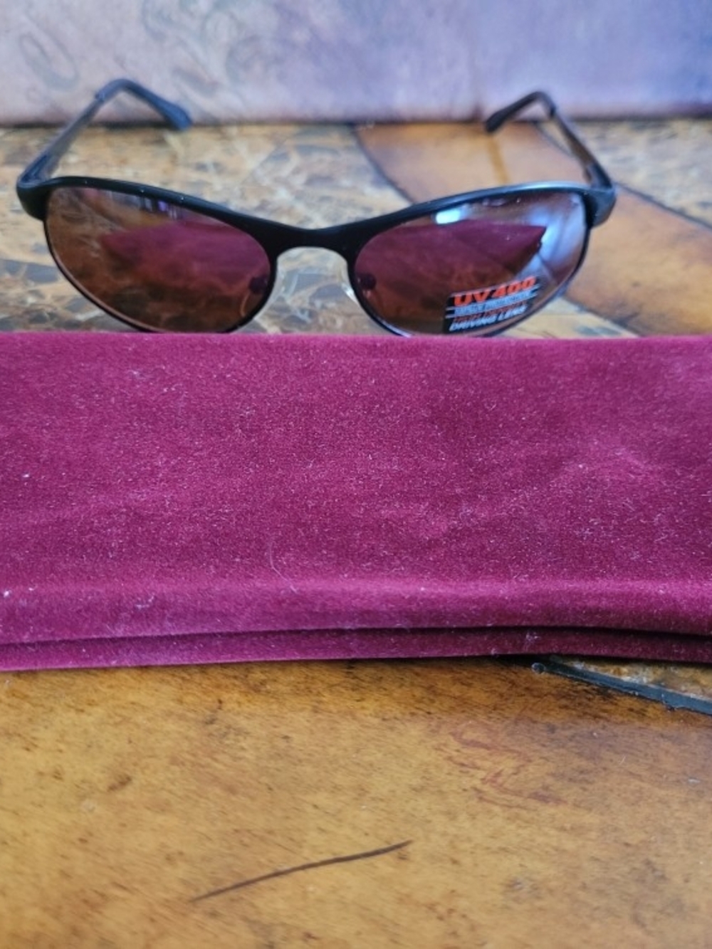 Women’s Black Sunglasses with Burgundy Lenses